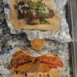 Bean and cheese with bacon and barbacoa. The red salsa is great!