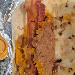 Bean and cheese. Skip the bacon, it doesn't add anything.