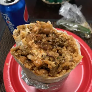 Another beautiful burrito from agua dulce. Asada and pastor mix supreme.