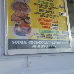 a menu on a food truck