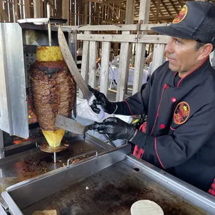 Javier preparing the food at our event!
