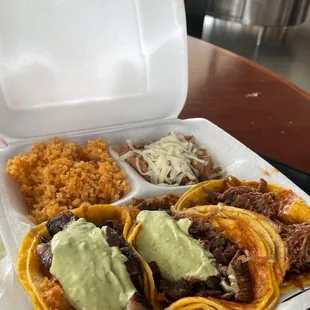 Tacos, birria, and beans/rice