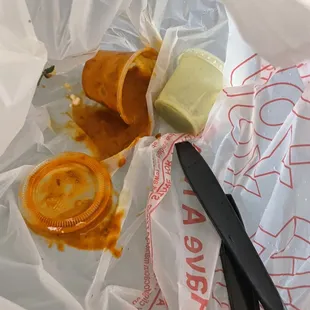 a piece of bread and butter in a plastic bag