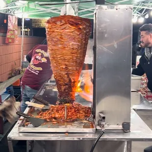 Trompo Al Pastor. Tacos Tuesday = $1.00 tacos!