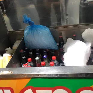 a bag of ice and a bag of soda