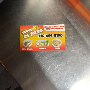 a business card on a table