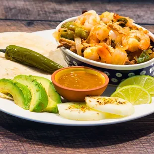 Chicken, beef, shrimp fajita