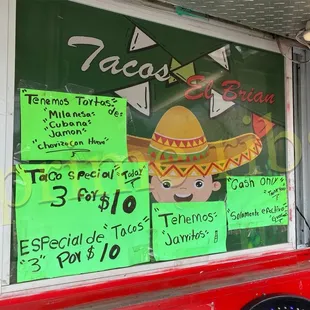 a sign in the window of a mexican restaurant