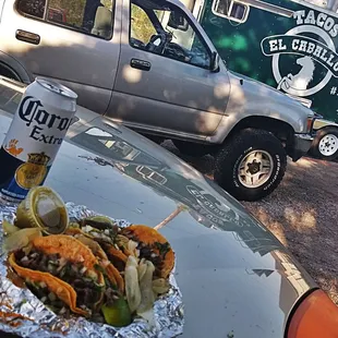 a taco truck in the background