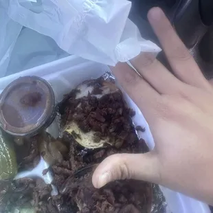 My hand in reference to the tostada