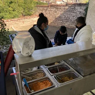 Rice, beans, chicken, beef and pork and tortillas