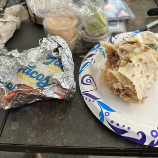 My carnitas burrito , first bite without salsa and lime. I could eat this by it self lol. So good.