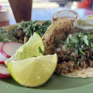 Tacos with handmade tortillas! Sooo good, both salsas were hot and delicious!