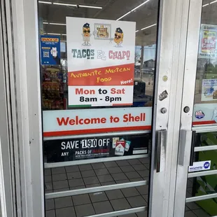 Sign on gas station door