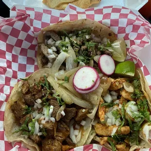 Top asada, left bottom pastor, right pollo...