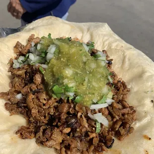 Al Pastor Burrito (I added onion, cilantro, salsa before they roll it up). Very good, lots of meat.