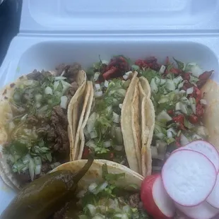 Tacos de asada and Al pastor