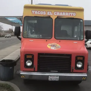 a taco truck parked in a parking lot