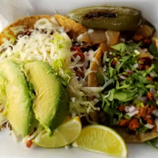 AlPastor taco and steak tostada.