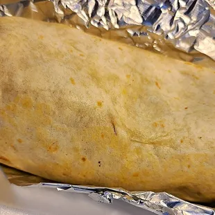Burrito with birria - $10.59 on Doordash
