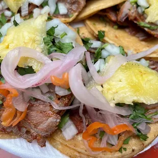 Tacos al pastor with habanero/pickled onions