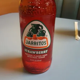 a bottle of darritos strawberry soda