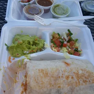 Barbacoa (steak) burriro in a to-go box