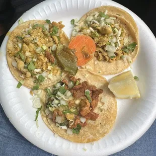 Pollo and al pastor tacos