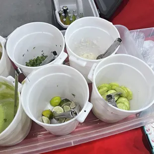 Onions, cilantros, limes, cucumbers.