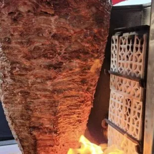 a pita being cooked on a grill