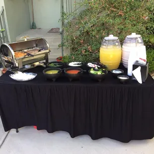 Full set up with half pans of beans and rice. Horchata and pineapple waters.