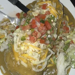 Cali Burrito smothered in green chili