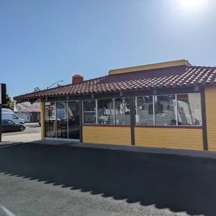 Parking lot has about a dozen spaces.