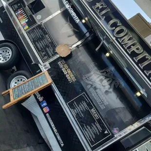 a taco truck parked in a parking lot