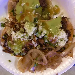 Taco de tripa and two al pastor vampiros