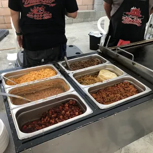 a line of food being prepared