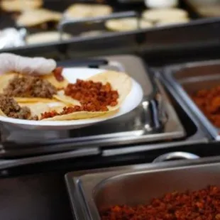 a person holding a plate of food