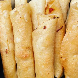 a close up of a plate of tacos