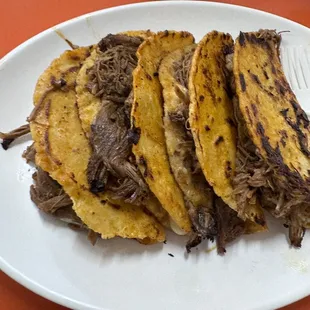 Birria tacos cheese on homemade tortillas