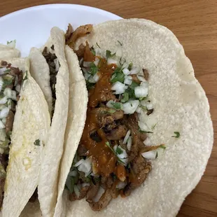 Weekend special. 4 tacos handmade tortillas with a drink for $13.99.