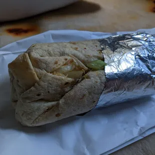 a burrito wrapped in foil