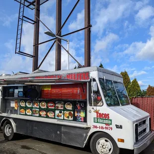 a taco truck parked in a parking lot