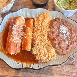 Combo plate chicken tamale and carne asada enchilada