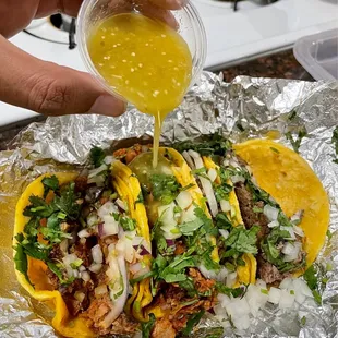 Carne asada, chorizo and al pastor tacos (to go). Dinner 12/25/2020