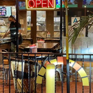 They&apos;re open and serving. Note the mask.