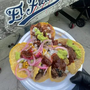 Our delicious tacos topped with our popular pickled red onions