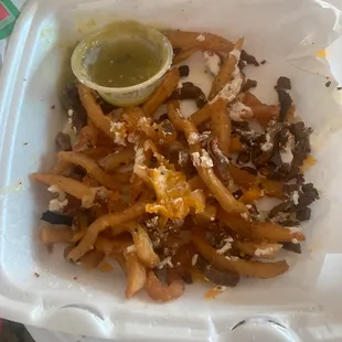 Asada fries I really tried to like. Super salty, soggy, cold and old tasting. No jalapeños. Very little cheese and cream. Just gross.