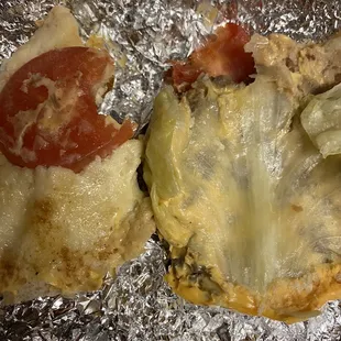 torta?? with american cheese and i guess? carne asada pressed into soggy bread ??