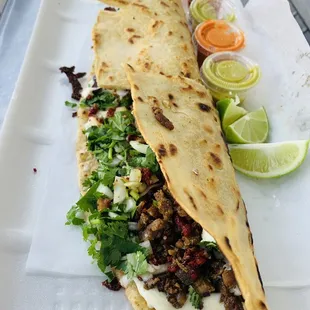 Machete with Campechanos (beef, chorizo, cheese, onions and cilantro) $10