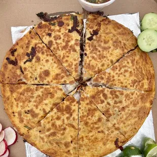Birria pizza with consume